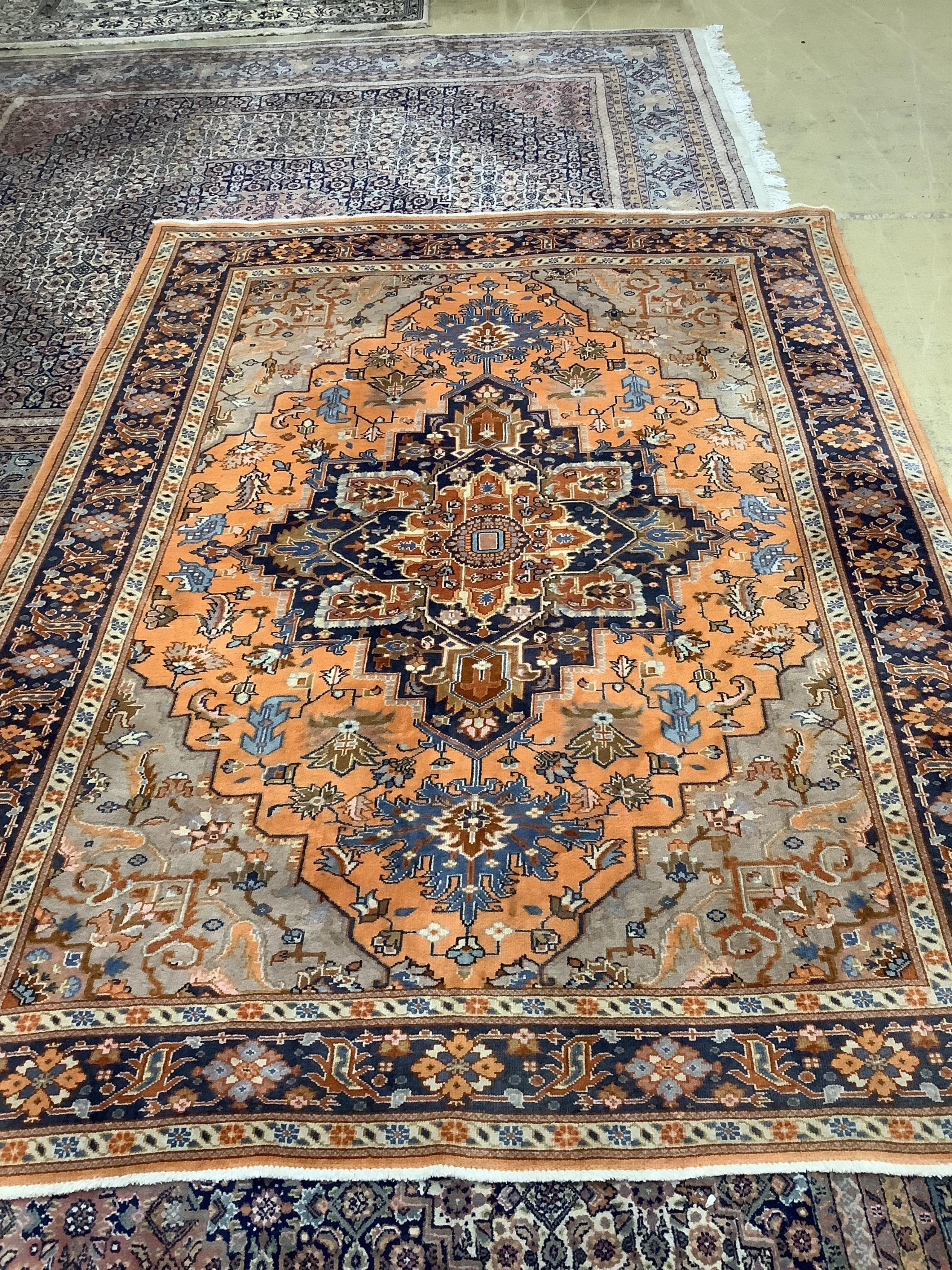 A North West Persian peach ground carpet, 270 x 204cm. Condition - fair